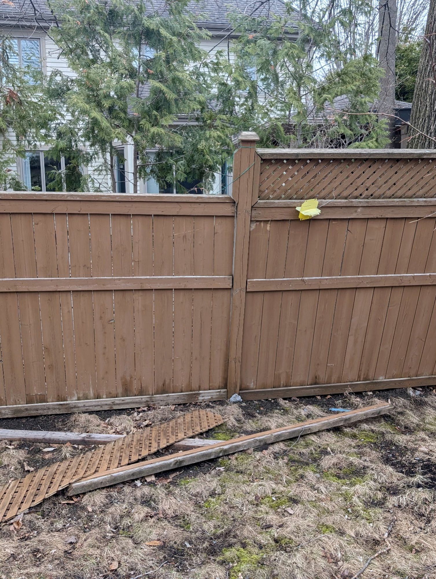 Broken lower boards and fallen lattice