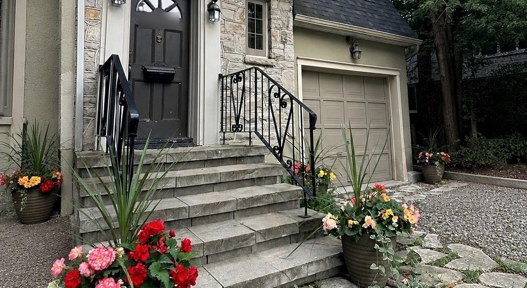 Before: Stone and stucco house exterior refreshed