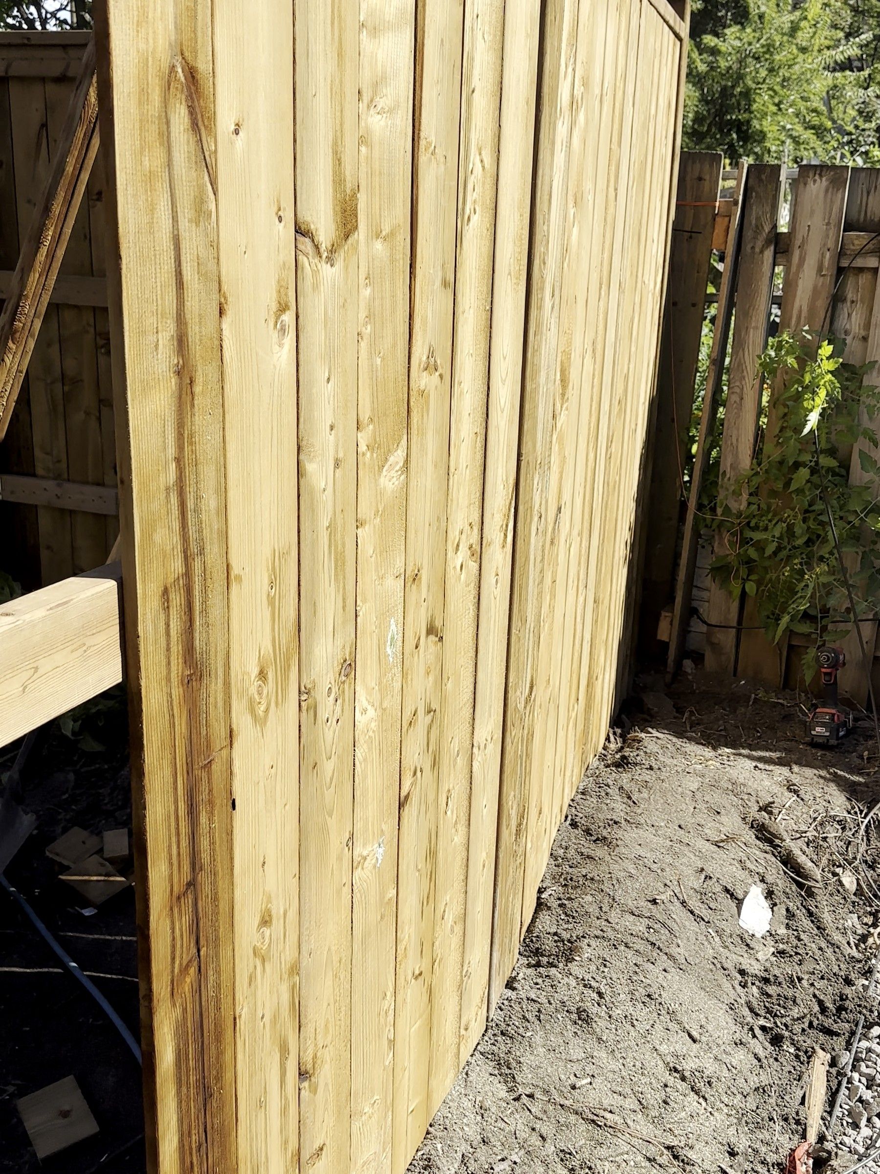 Close view of new board-on-board wood fence panels