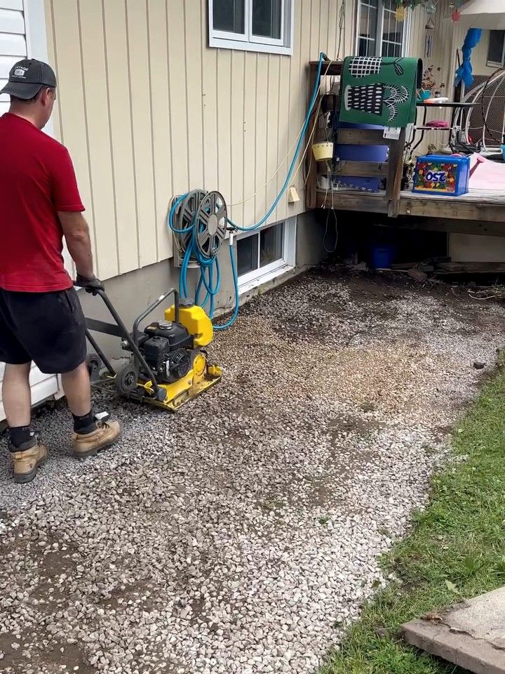 Base compacted with a plate compactor