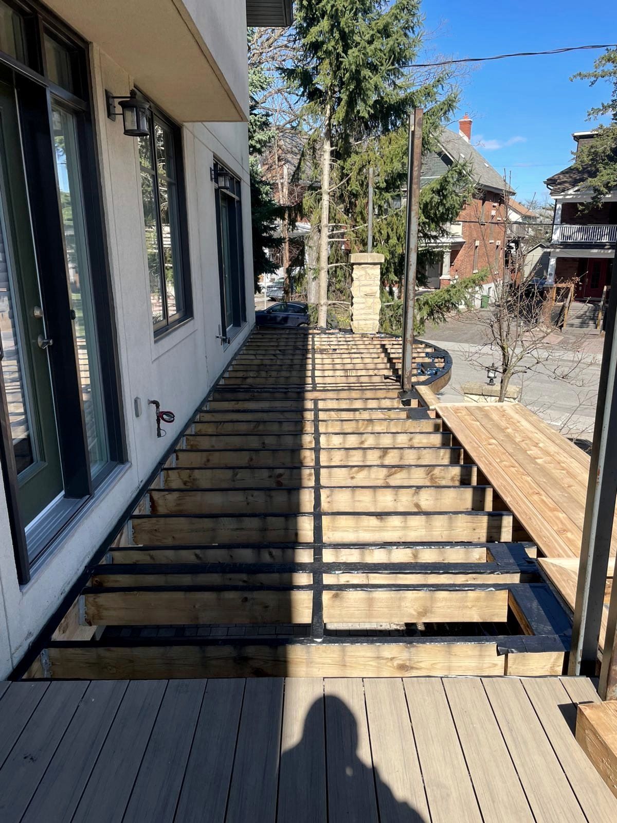 Taped joists next to the new boards