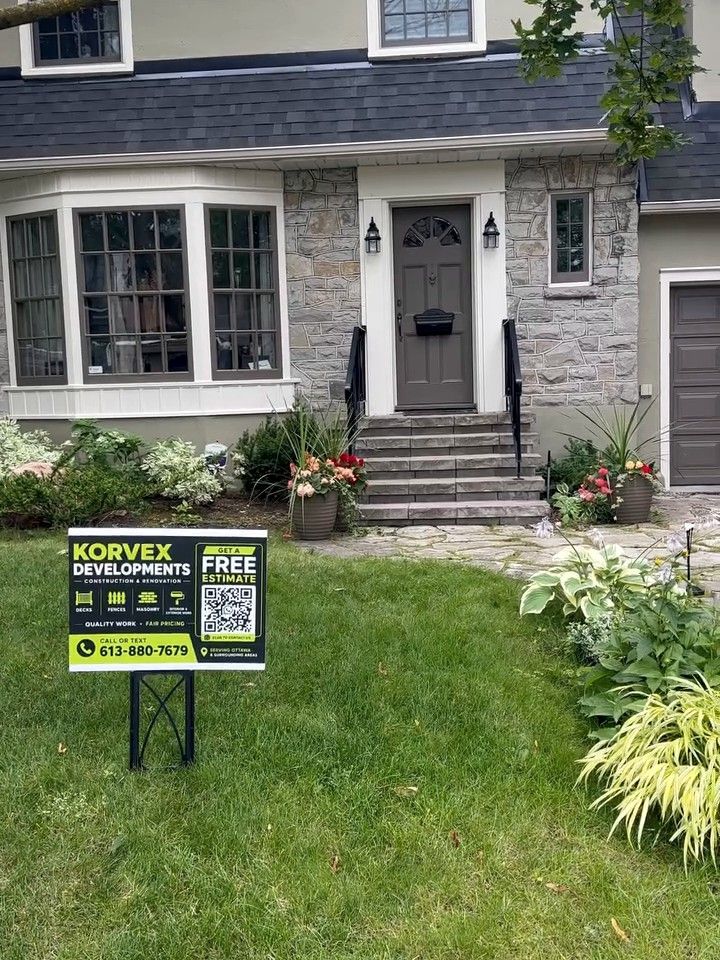 Korvex sign on the lawn during the job